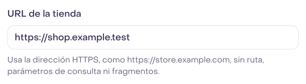 Campo real URL de la tienda con origen ficticio HTTPS y ayuda completa de formato.